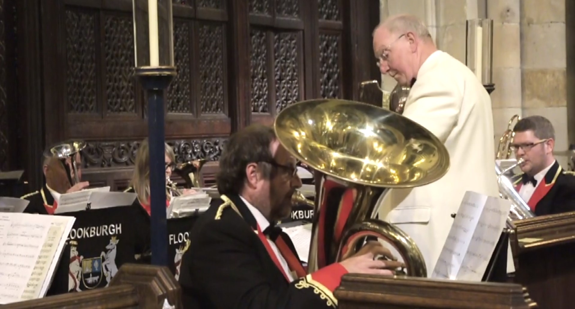 Inner Tuba performing with brass band or ensemble