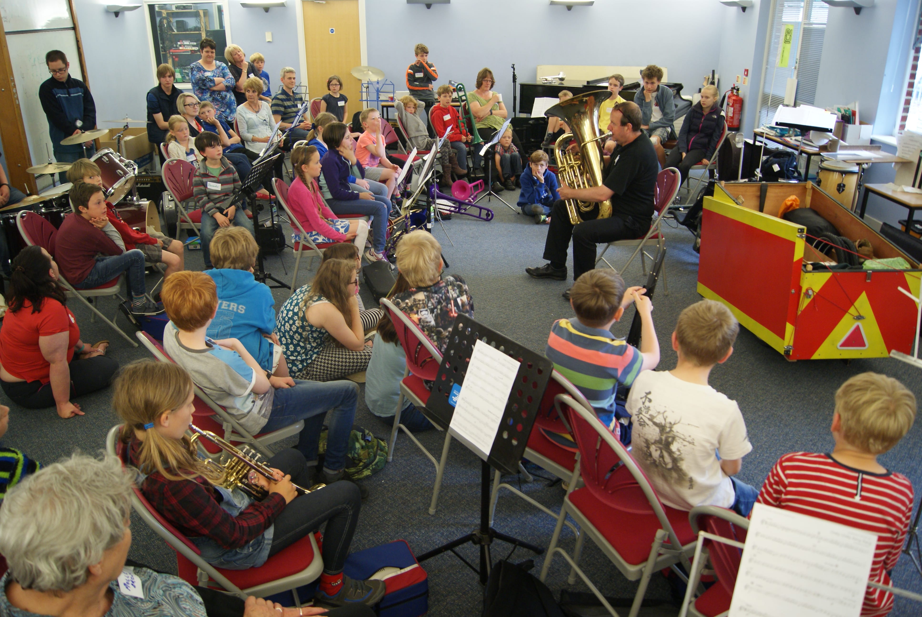 Inner Tuba performing with brass band or ensemble