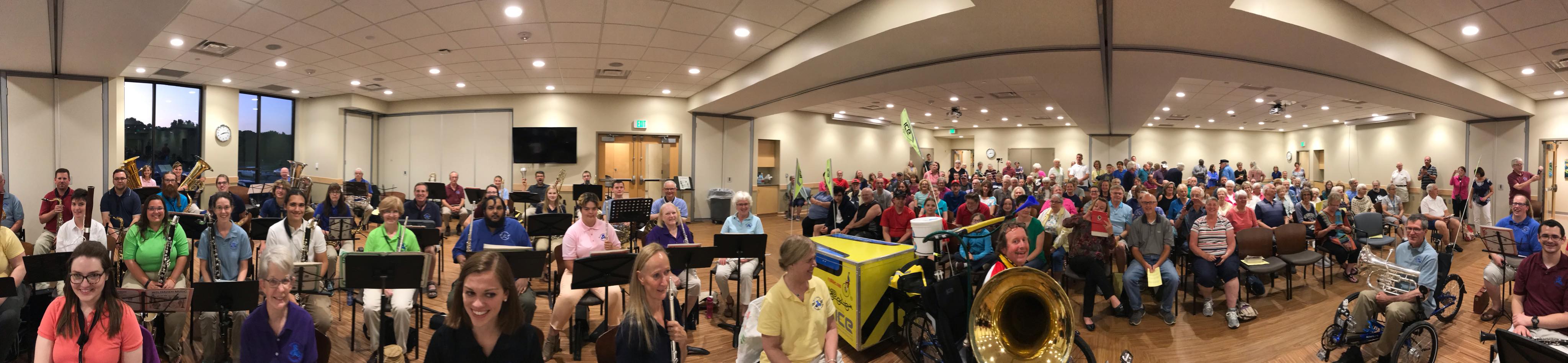 Inner Tuba performing with brass band or ensemble