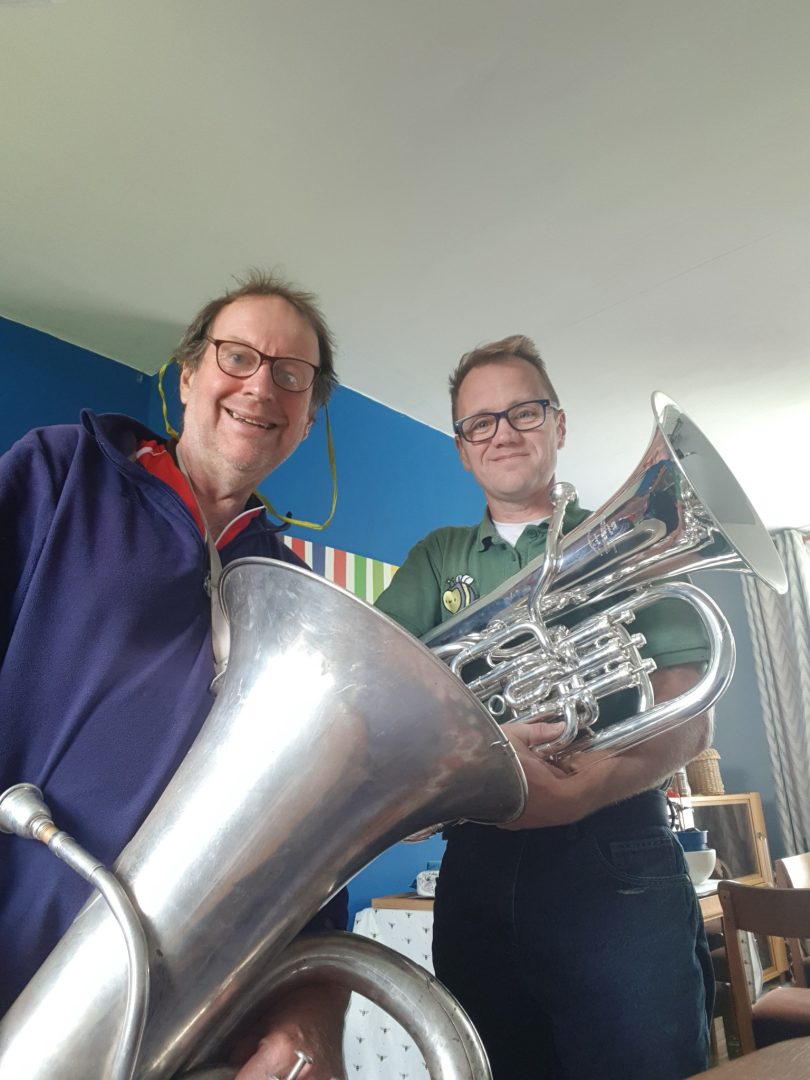 Inner Tuba performing with brass band or ensemble