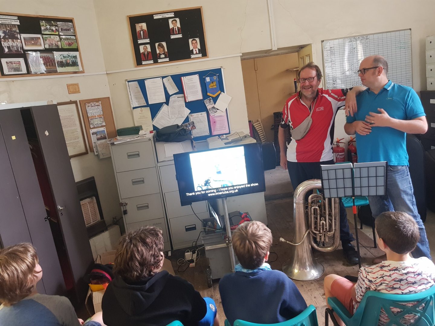 Inner Tuba performing with brass band or ensemble