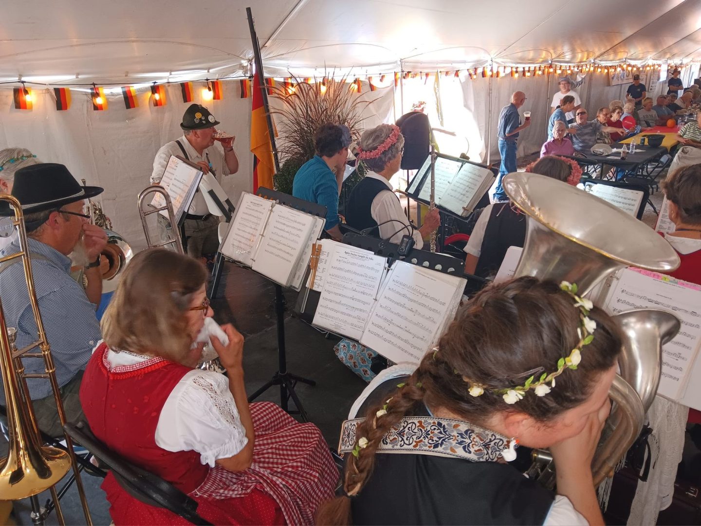Inner Tuba performing with brass band or ensemble