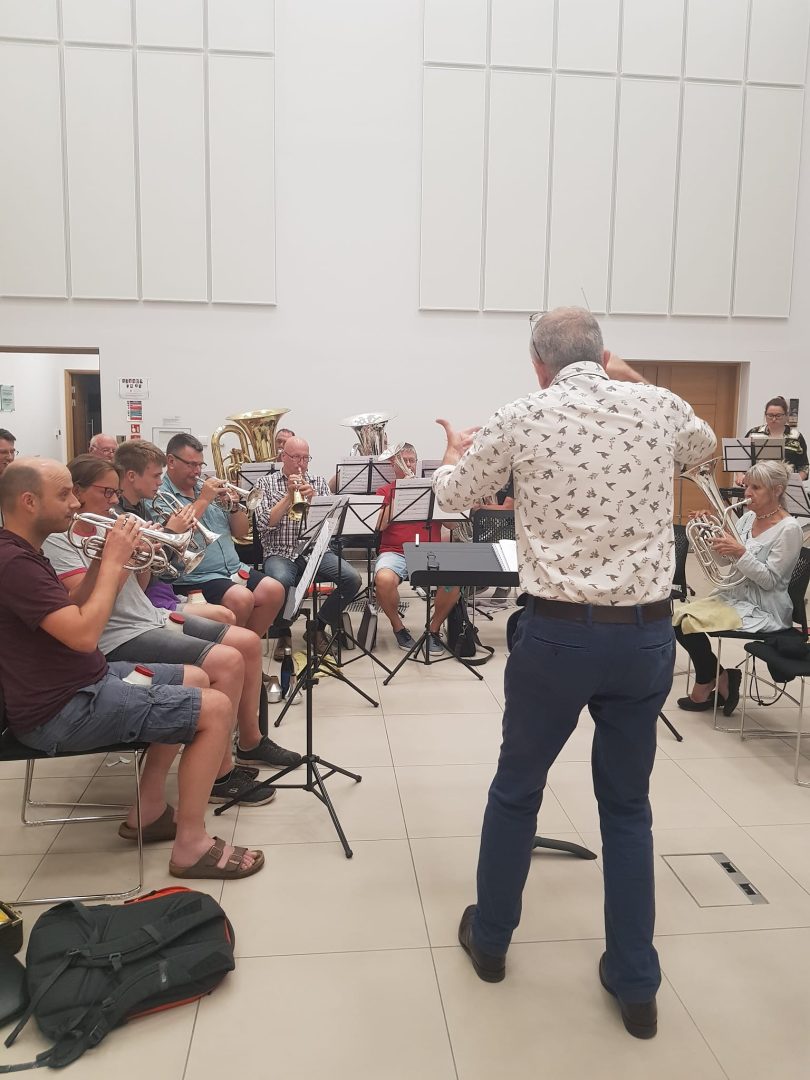 Inner Tuba performing with brass band or ensemble